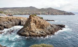 Small hill in the middle of the waters at La Bufadora area.jpg