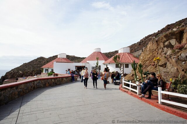 Tourists strolling on viewing area of La Bufadora.jpg