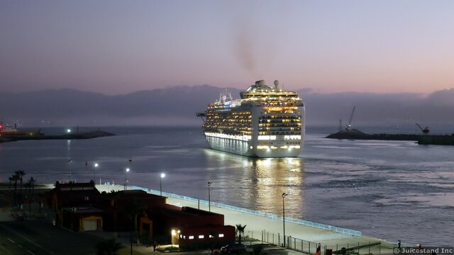 Emerald Princess cruise ship sailing away Ensenada after Sunset